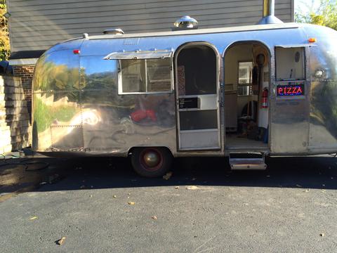 Photo of side of Airstream parked in the Fiorito's driveway